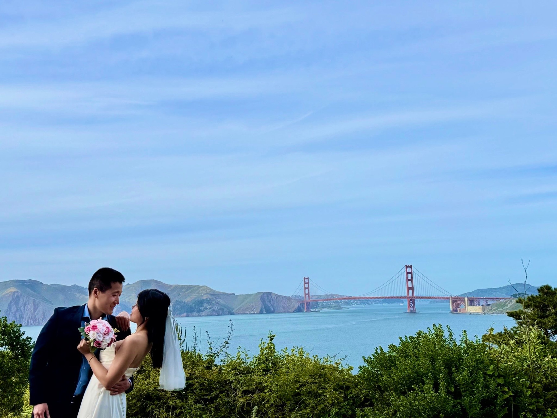 Kimberly and Walter in front of the Golden Gate Bridge